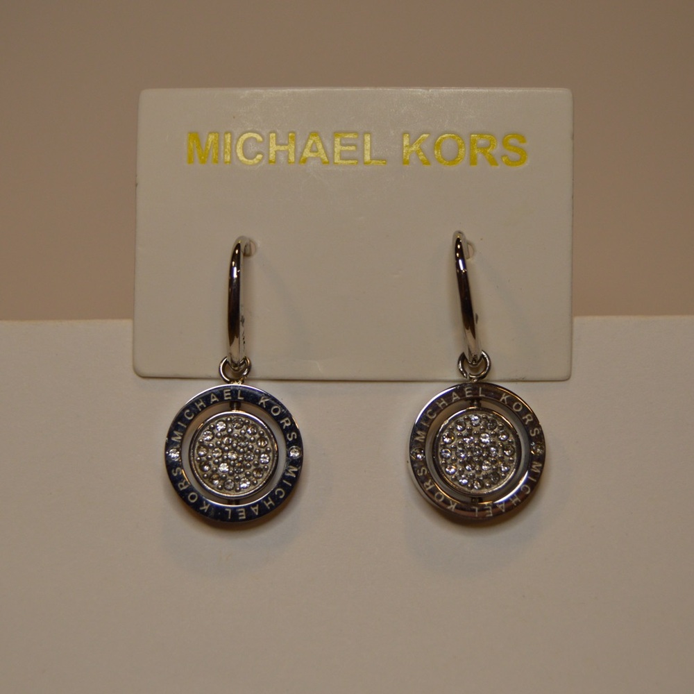 Michael Kors ‘Silver Tone Crystals Flip
Rotating Drop Earrings’. Brand New.